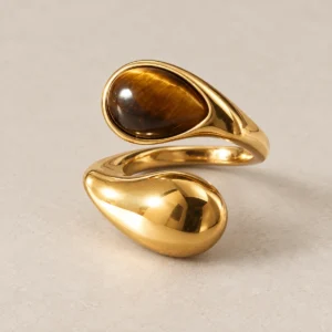 Anillo abierto dorado con piedra ojo de tigre