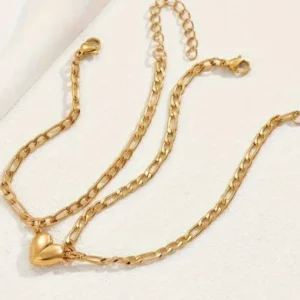 Pulseras doradas con corazón magnético para pareja