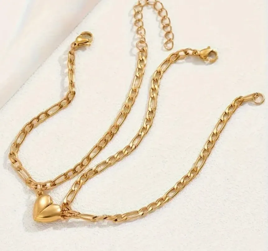 Pulseras doradas con corazón magnético para pareja
