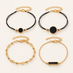 Set de pulseras negras y doradas para mujer