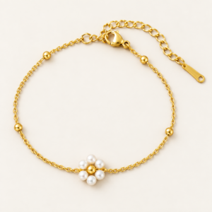 Pulsera dorada con flor de acero quirúrgico